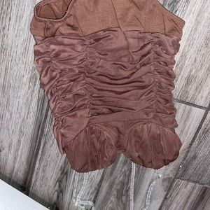 Bodysuit has diamond Straps